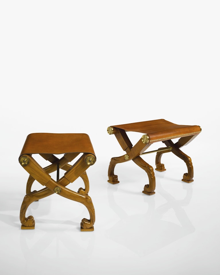 TWO "DIPHROS" FOLDING STOOLS by Terence Harold Robsjohn-Gibbings