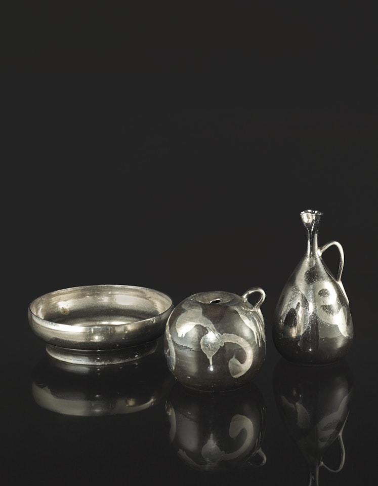 TWO HANDLED VASES AND A COUPE by Jean Besnard