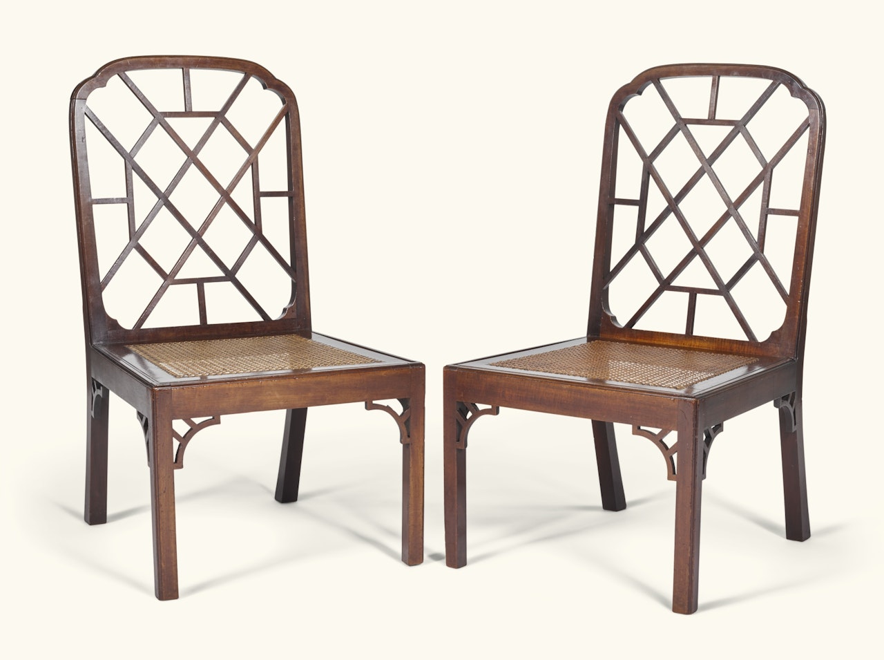 A pair of George III mahogany side chairs by Anonymous