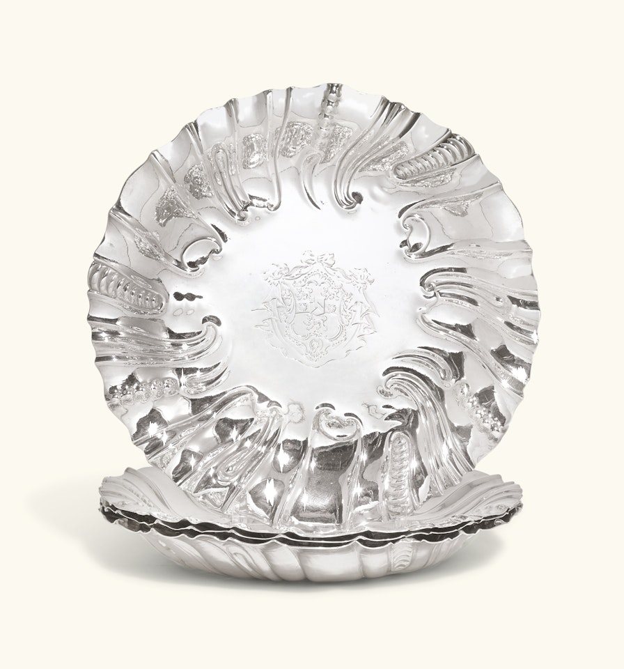 A set of four George II silver dishes by Anonymous