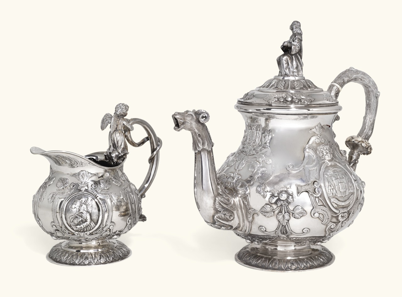 A Dutch silver teapot and cream jug by Anonymous