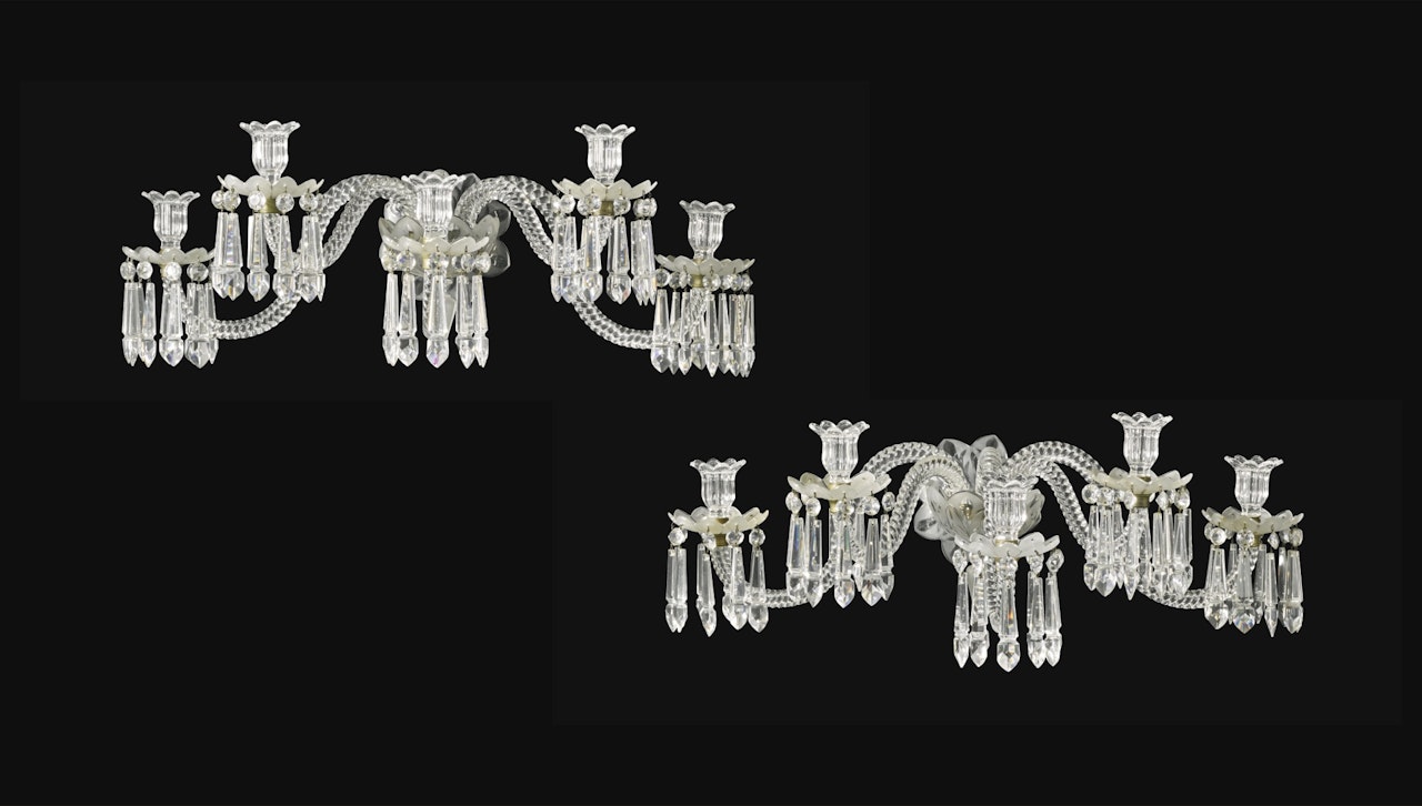 A pair of French cut and moulded glass five light wall lights by Baccarat by Anonymous