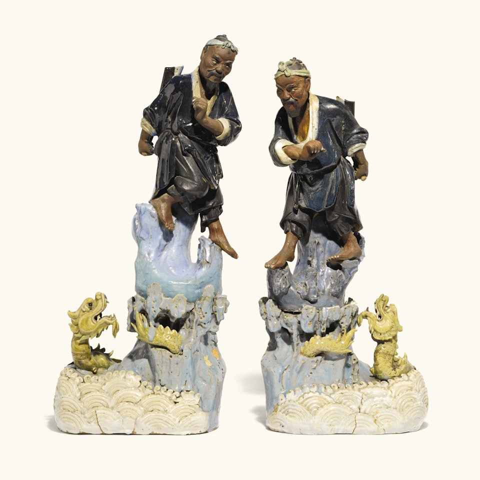 A pair of Chinese stoneware figures on bases by Anonymous