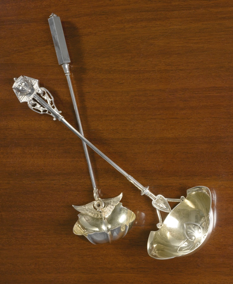 Two American Silver Egyptian Style Ladles, Wood & Hughes, New York, And Gorham Mfg. Co. by Anonymous