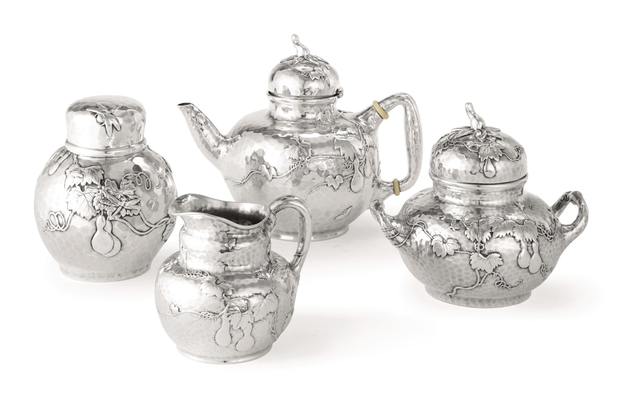 An American silver four-piece Japanese style tea set by Anonymous