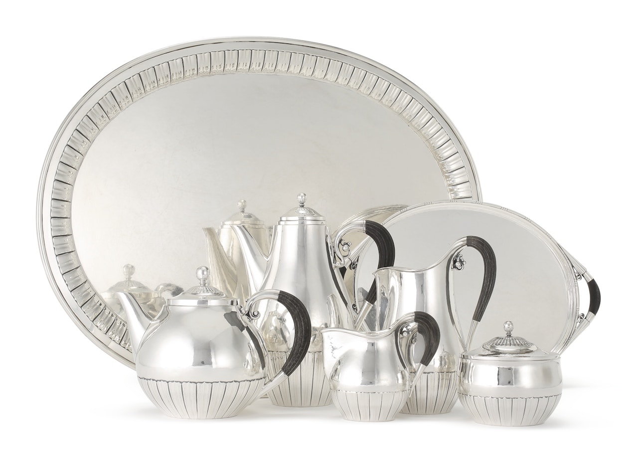 A five-piece Danish silver Cosmos pattern tea and coffee set with matching tray, no. 45 by Anonymous