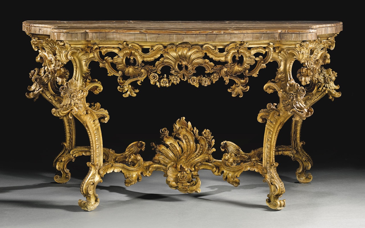An Italian carved giltwood console table by Anonymous