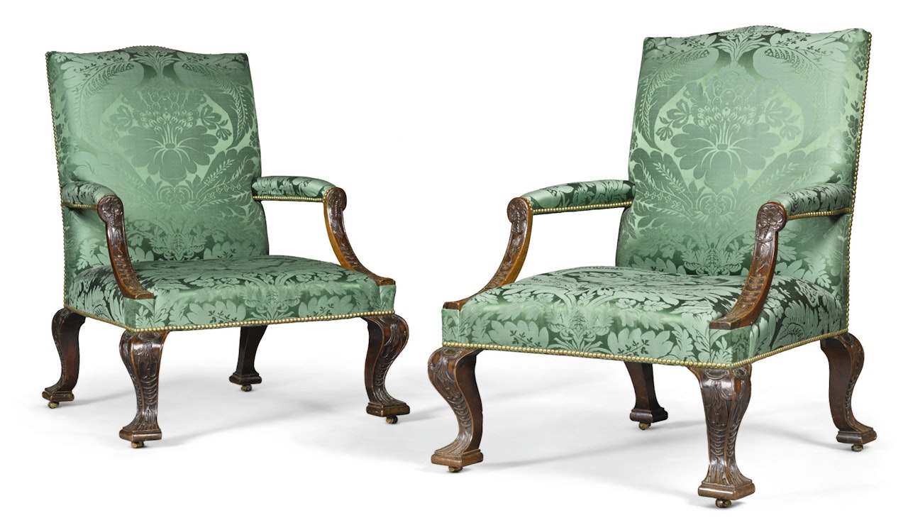 A pair of George II mahogany library armchairs by Anonymous