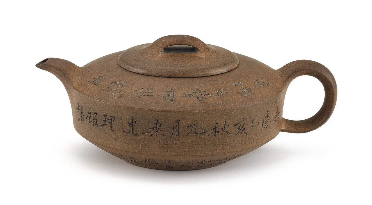 AN INSCRIBED DOCUMENTARY YIXING STONEWARE TEAPOT AND COVER by Anonymous