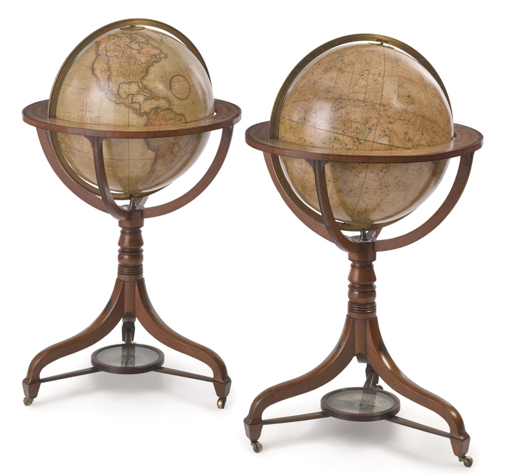 A pair of English 21-inch celestial and terrestrial globes by J&W Cary on Regency mahogany stands by Anonymous