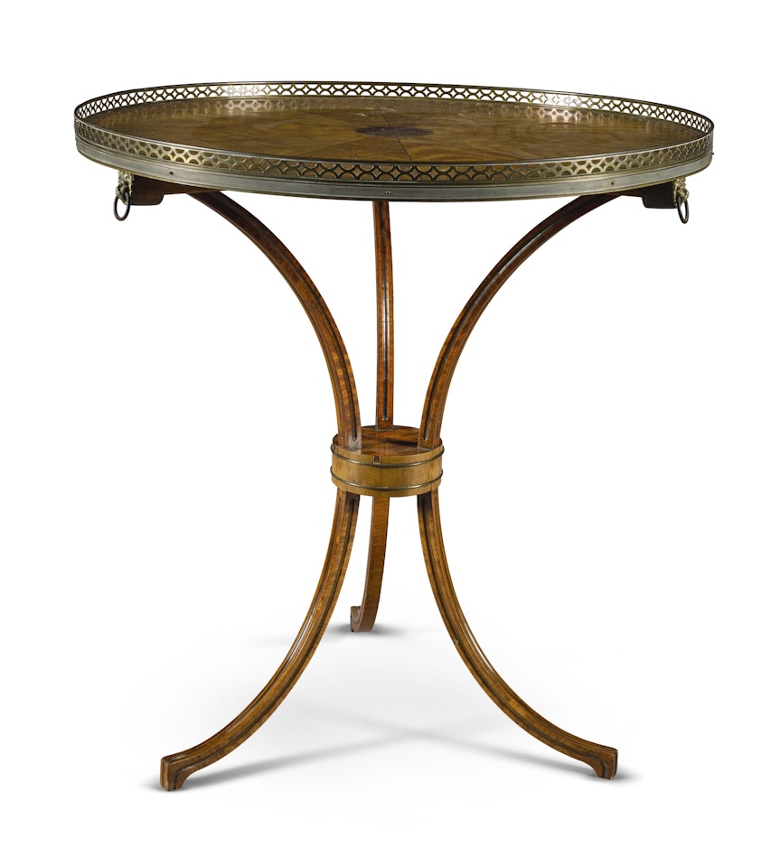 A Dutch neoclassical satinwood and mahogany guéridon in the manner of Matthijs Horrix by Anonymous