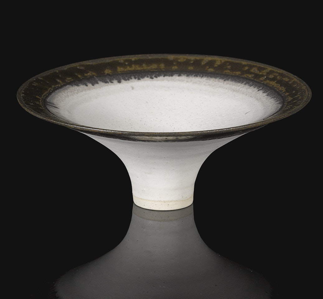 WHITE BOWL WITH FLARING BRONZED RIM by Lucie Rie