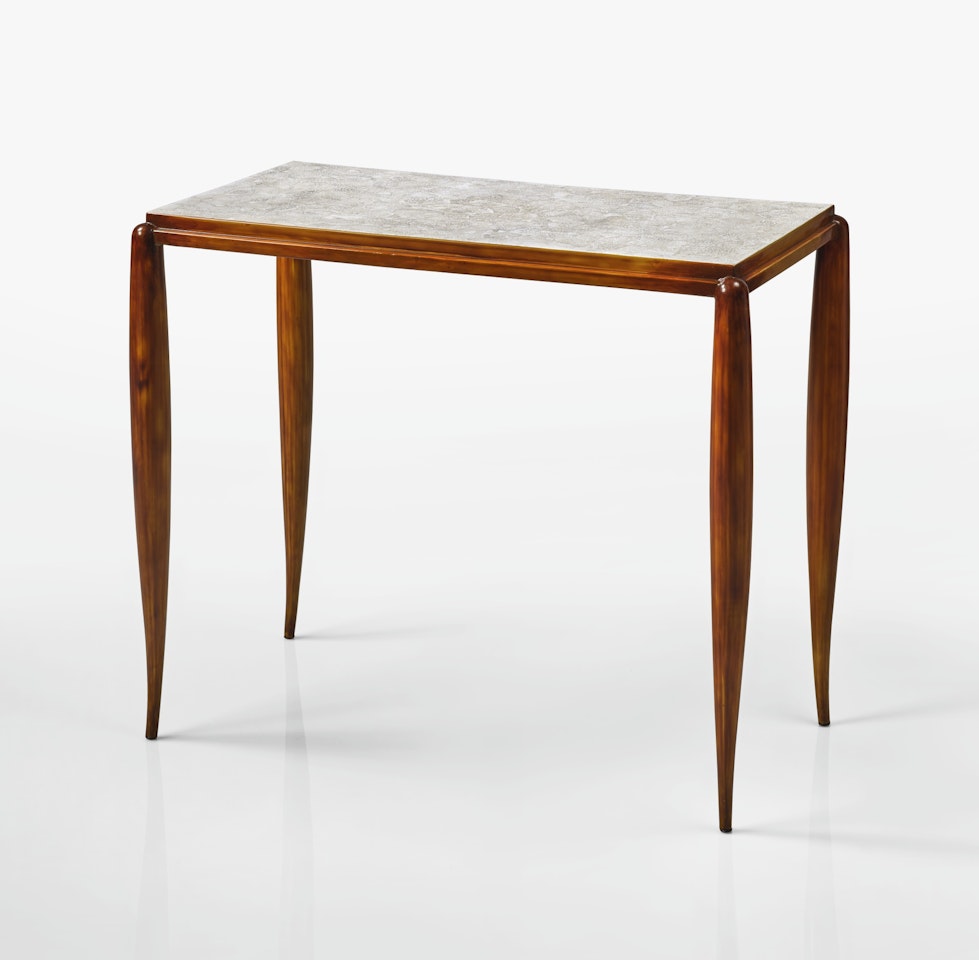 A RARE TABLE by Jean Dunand