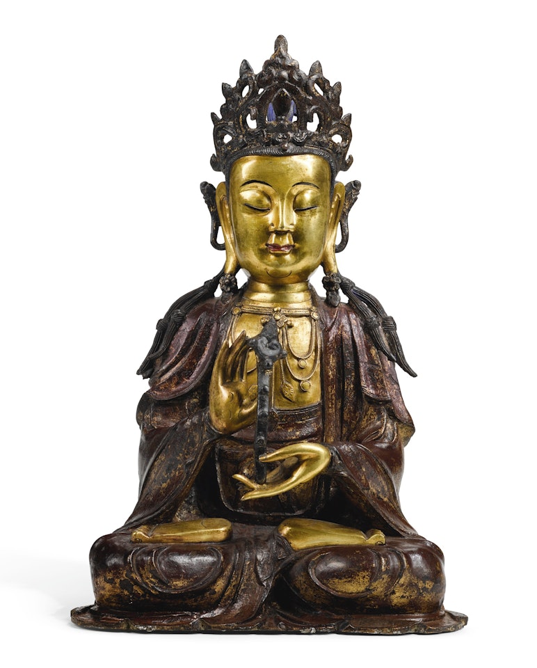 A LACQUERED PARCEL-GILT BRONZE FIGURE OF GUANYIN by Anonymous