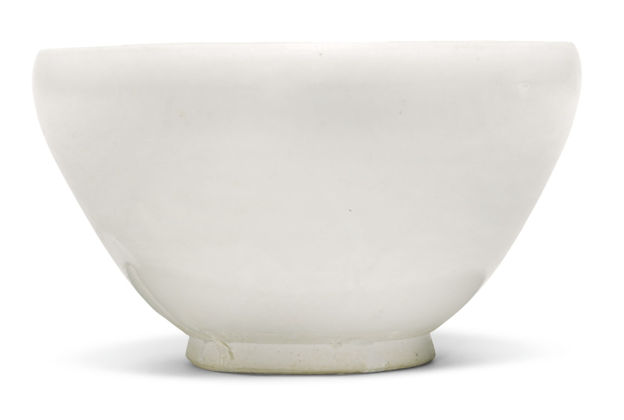 A WHITE-GLAZED BOWL  by Anonymous