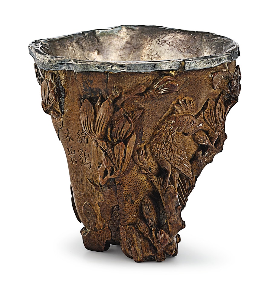 A CARVED AND SILVER-LINED CHENXIANGMU LIBATION CUP  by Anonymous