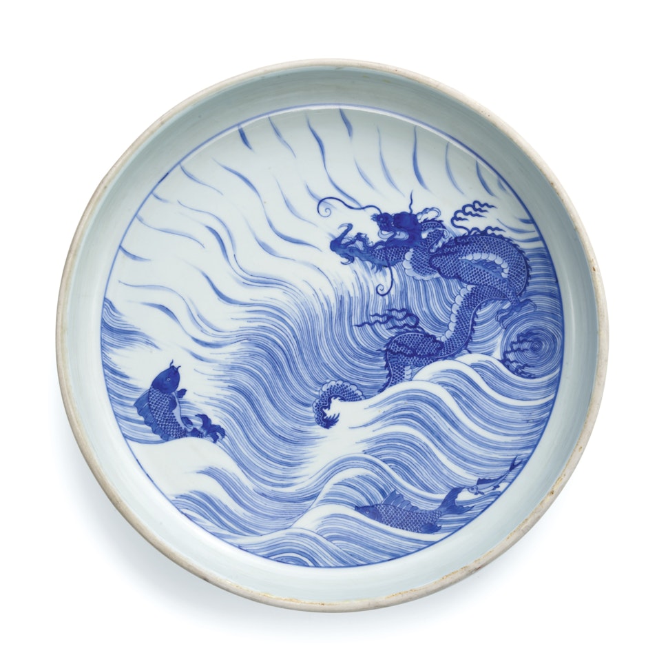 A LARGE AND RARE BLUE AND WHITE 'DRAGON AND CARP' BASIN by Anonymous