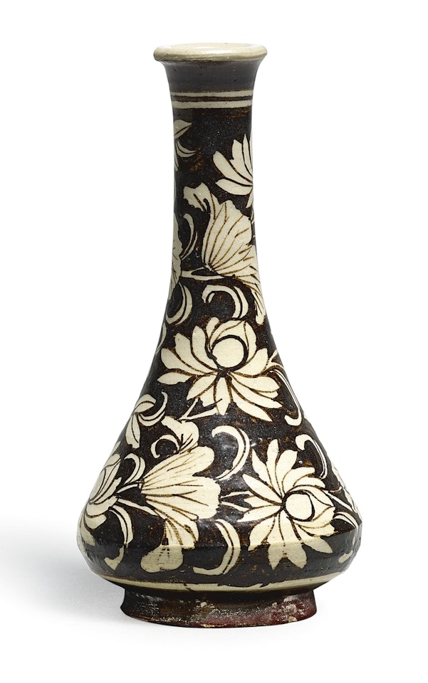 A SMALL JIZHOU REVERSE-DECORATED 'LOTUS' VASE by Anonymous