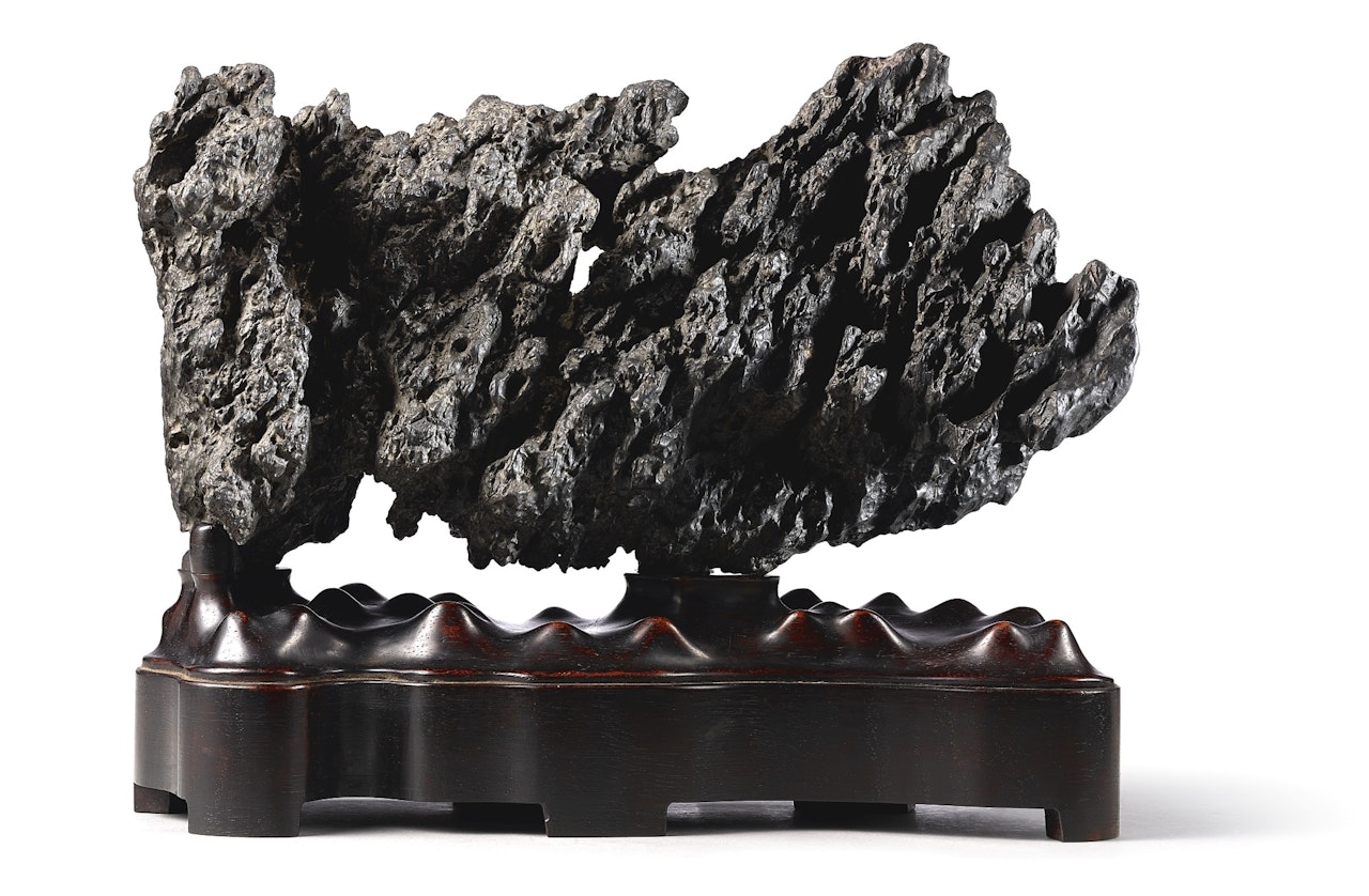 A DARK GREY 'YING' SCHOLAR'S ROCK by Anonymous