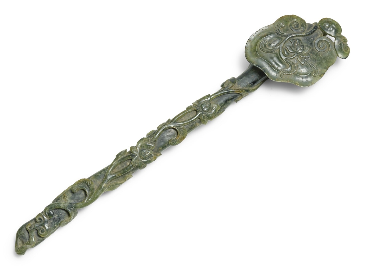 A SPINACH-GREEN JADE 'LOTUS' RUYI SCEPTRE by Anonymous