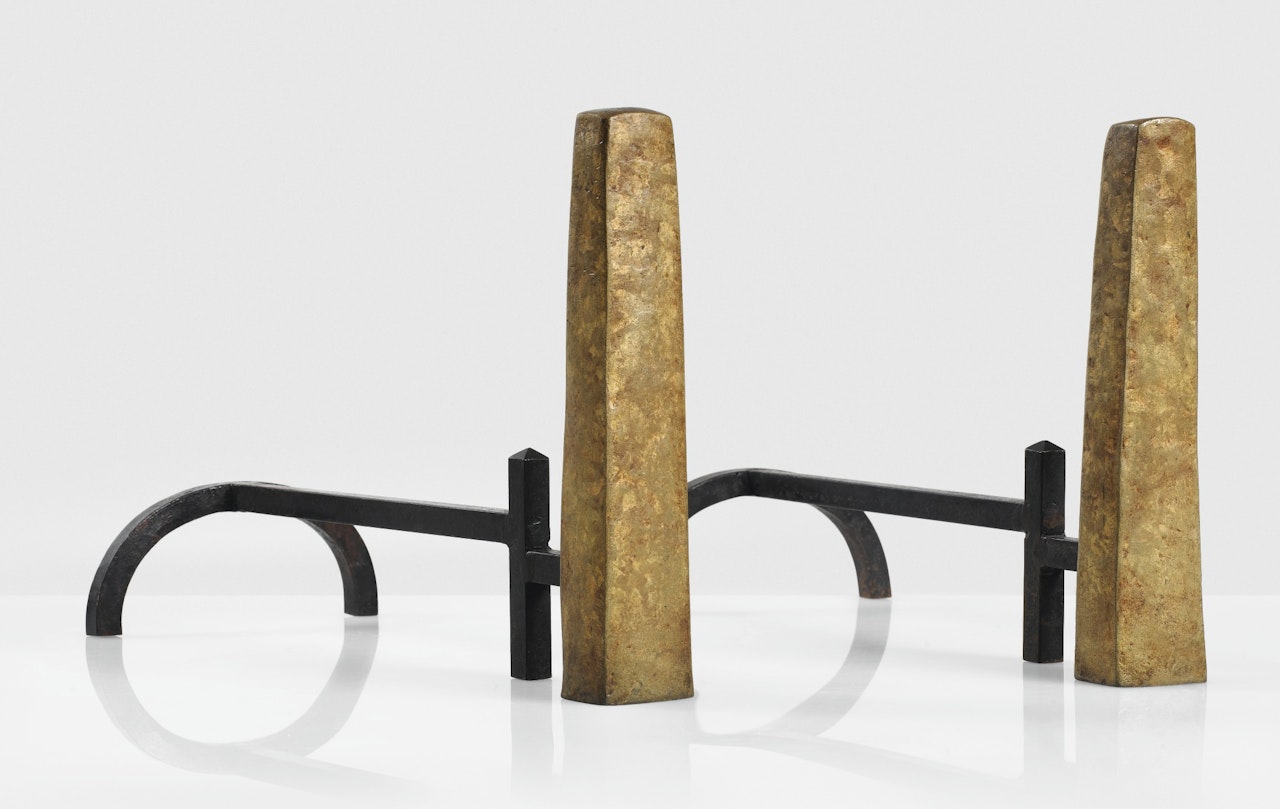 AN IMPORTANT AND RARE PAIR OF ANDIRONS by Alberto Giacometti