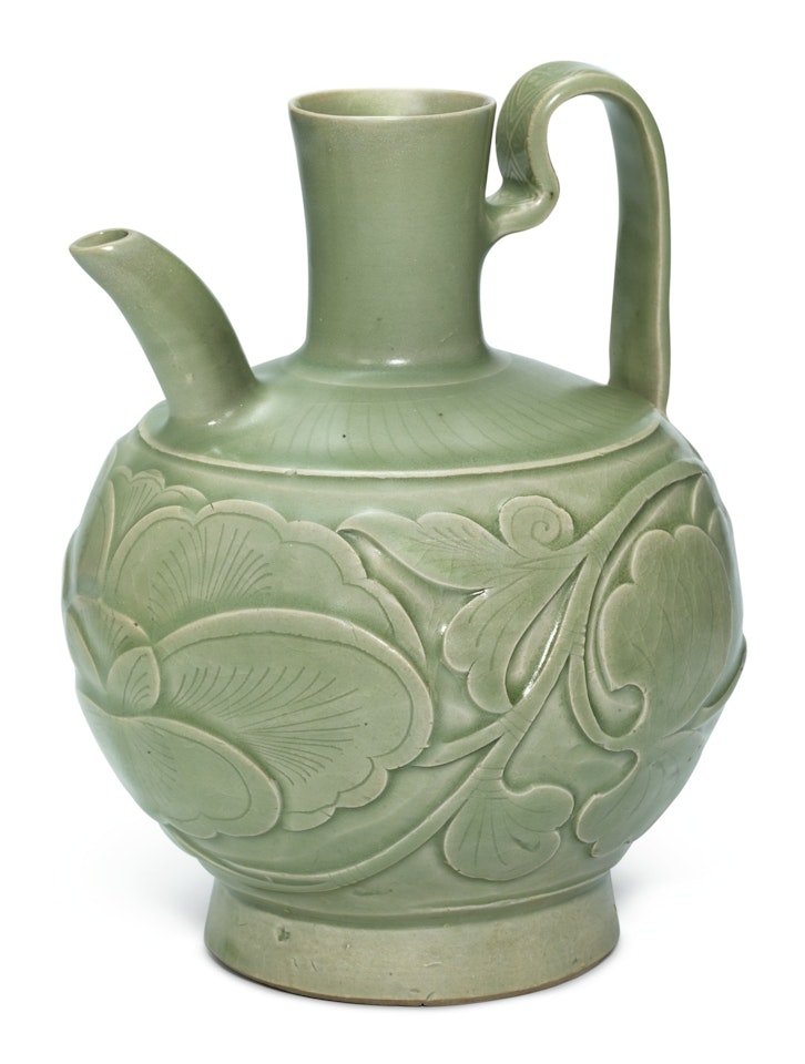 A CARVED YAOZHOU CELADON 'PEONY' EWER by Anonymous