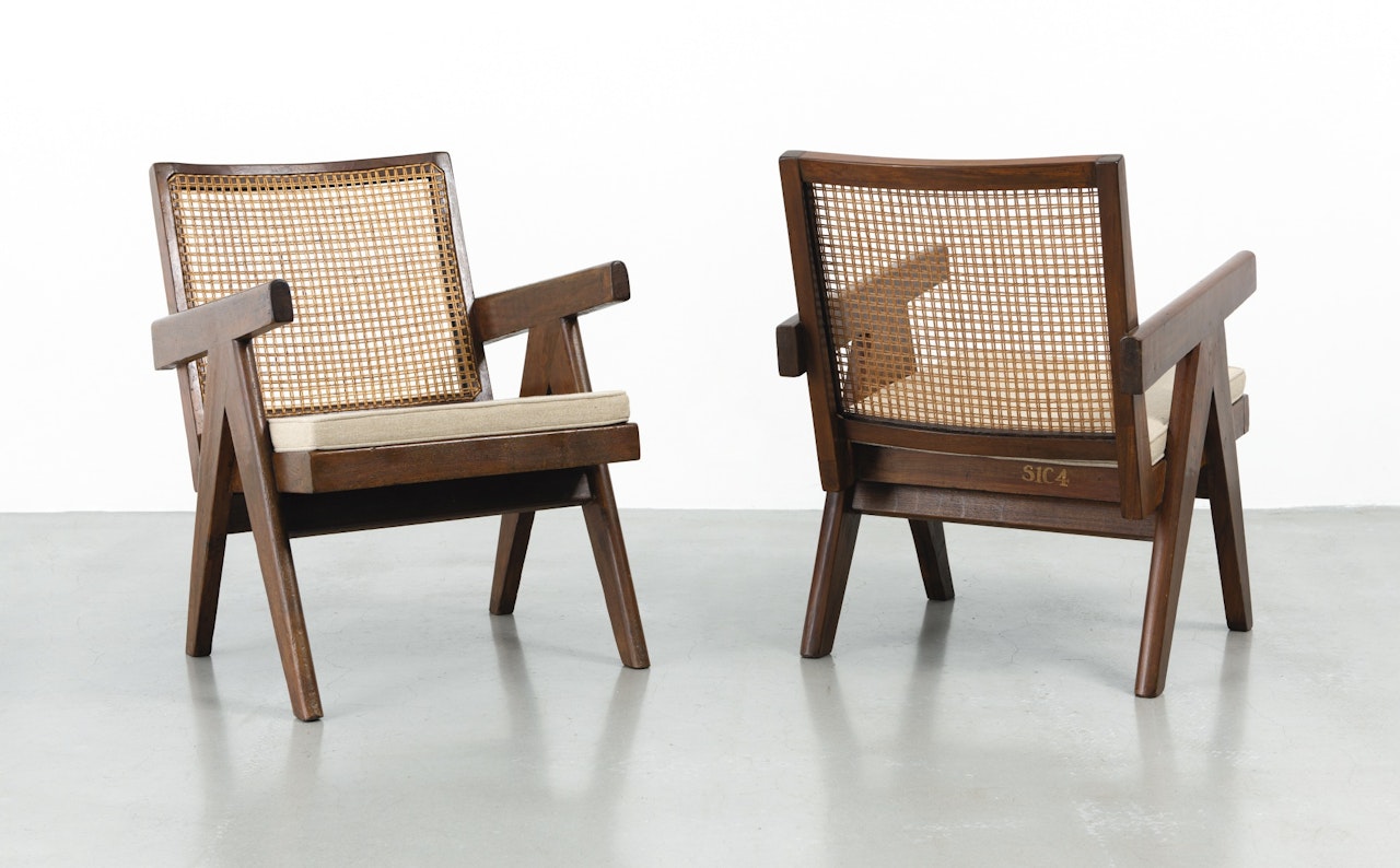 PAIR OF EASY ARMCHAIRS by Pierre Jeanneret