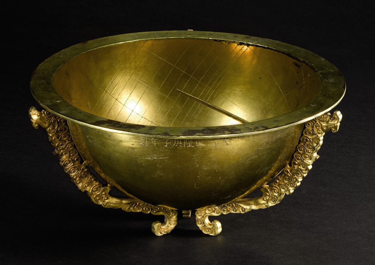 A RARE GILT-BRONZE SUNDIAL by Anonymous