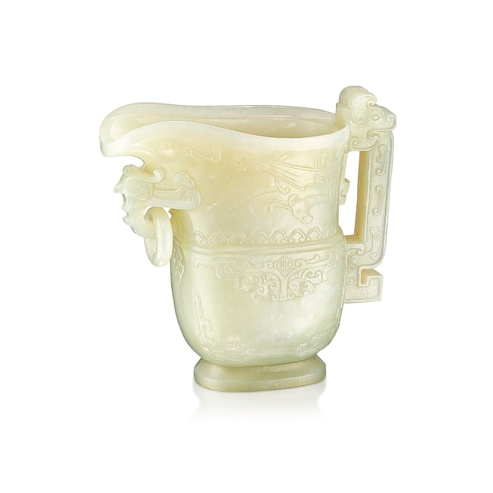 AN ARCHAISTIC CELADON JADE POURING VESSEL, GONG by Anonymous