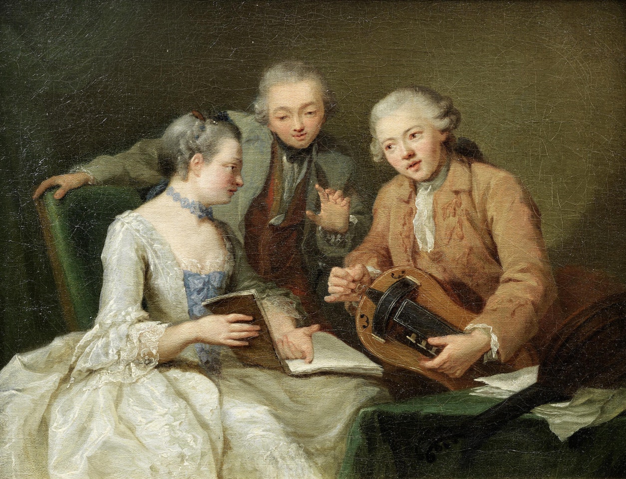 Elegant figures with a gentleman playing the hurdy-gurdy by French School