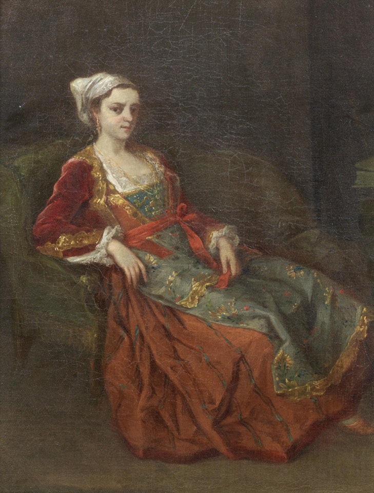 Portrait of a lady, full-length, reclining on a green chair by Neapolitan School