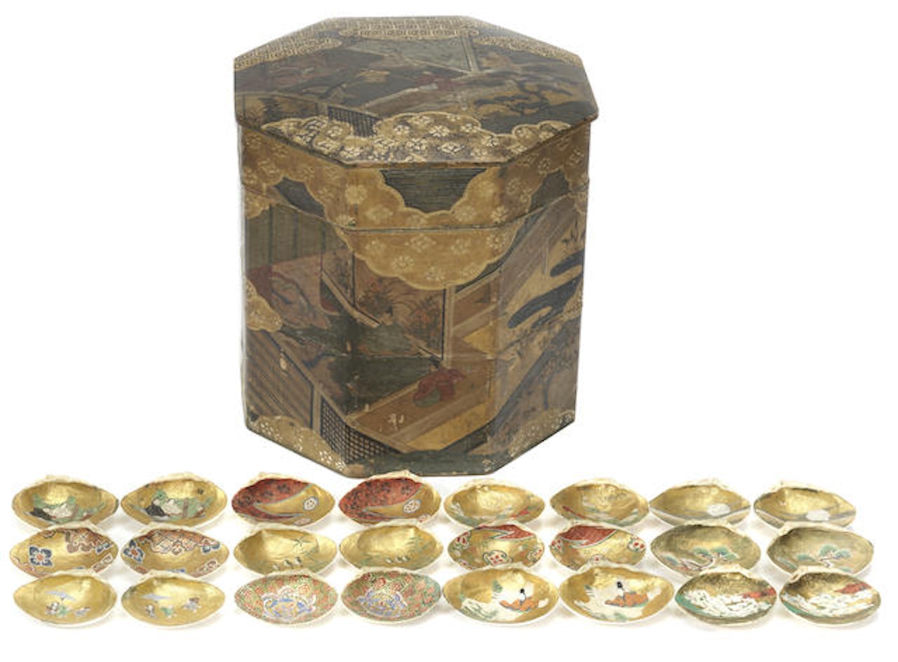 An octagonal paper-covered box for the shell-matching game with 78 painted clam shells by Anonymous