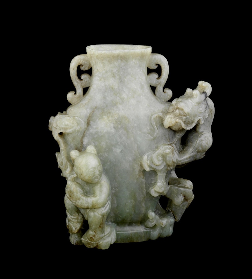 A pale green jade 'dragon and boy' vase by Anonymous
