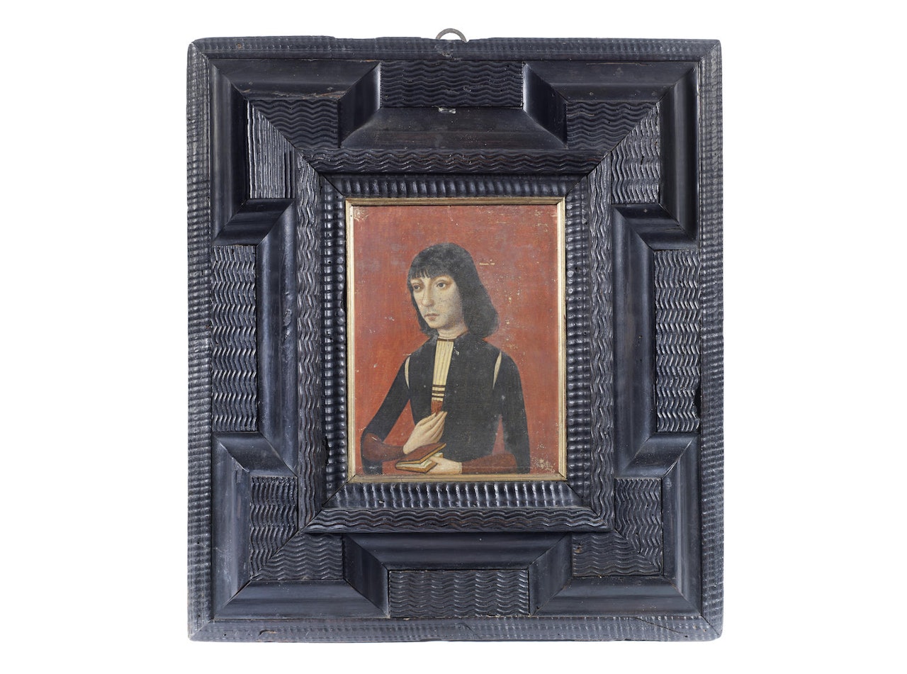 Portrait of a gentleman, half-length, in black costume, holding a book by French School