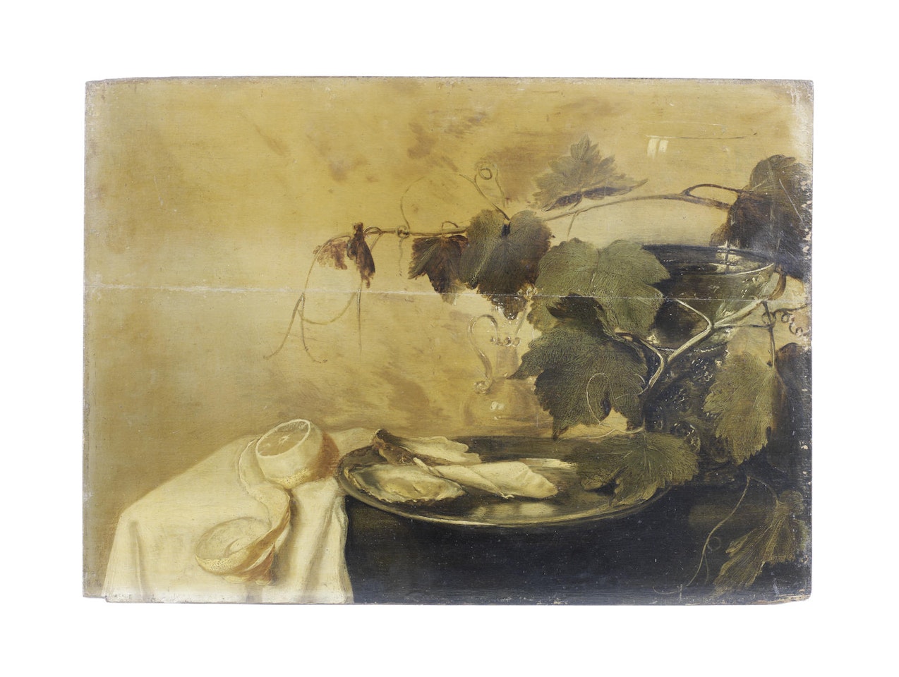 A pewter dish of oysters with a lemon and a roemer on a draped table by Dutch School