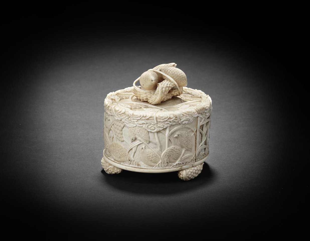 An ivory box and cover by Anonymous