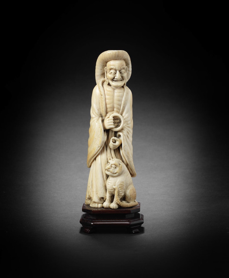 An ivory okimono figure of a Rakan by Anonymous