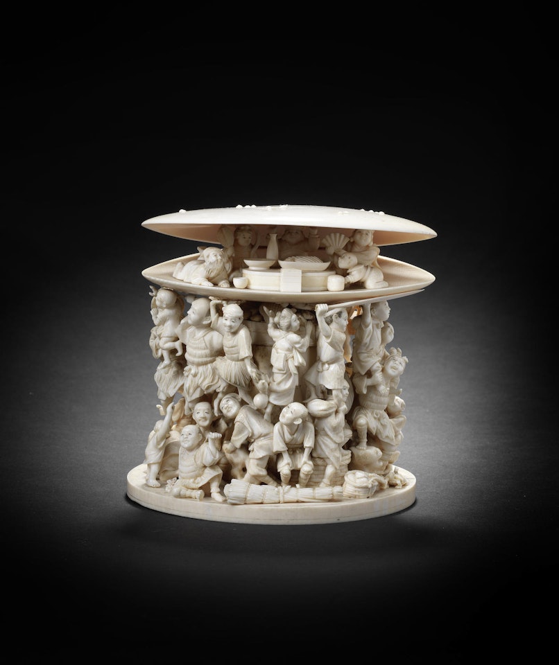 An ivory okimono figure group with a clam shell By Munemasa by Anonymous