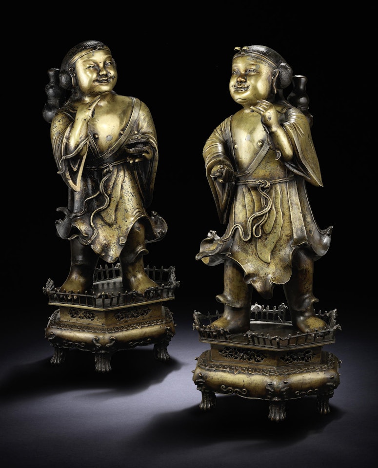 An exceptionally rare and large pair of bronze figures of the Hehe Erxian by Anonymous