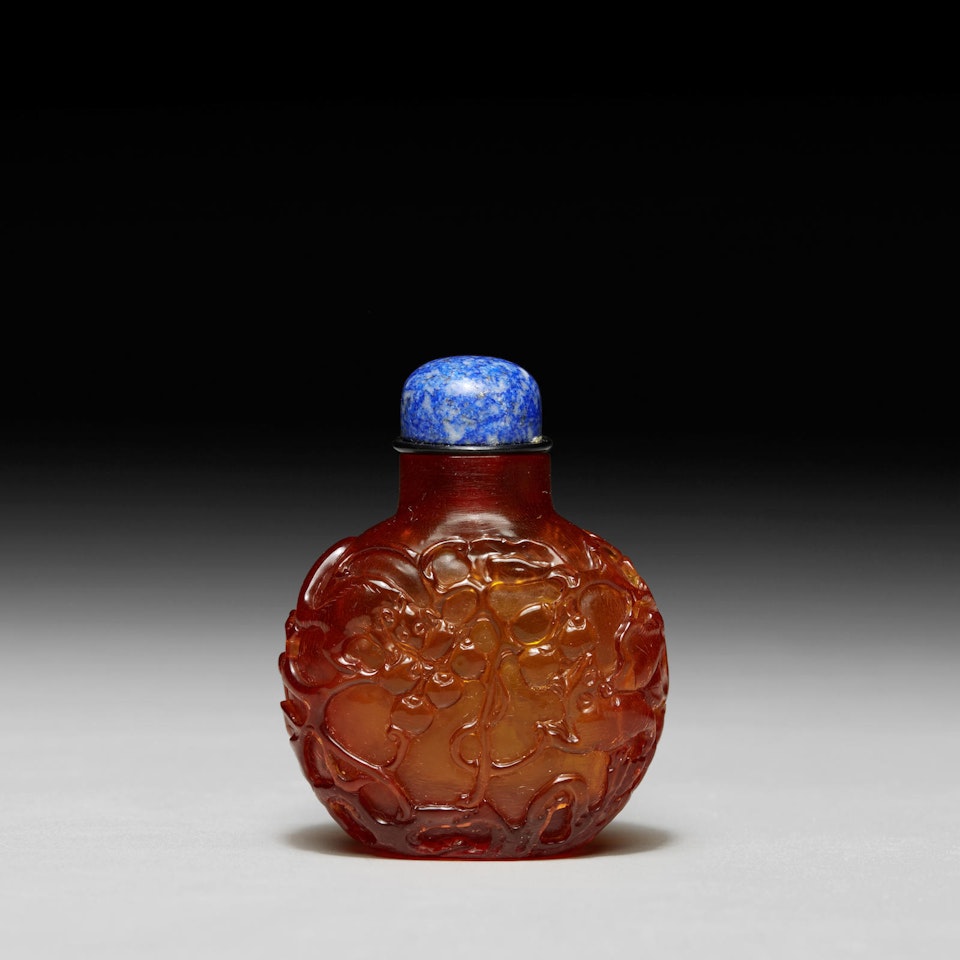 An amber snuff bottle by Anonymous