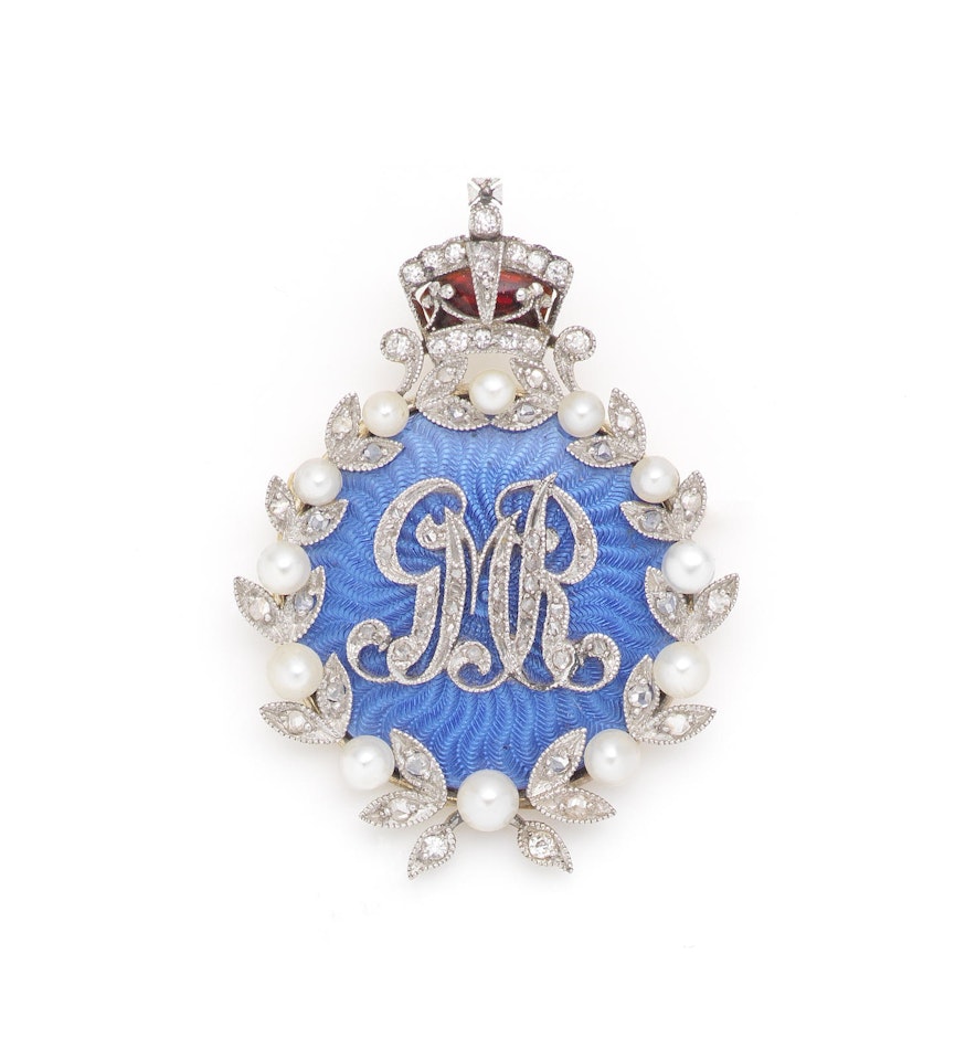A collection of enamel brooches and a US presidential commemorative charm bracelet by Anonymous