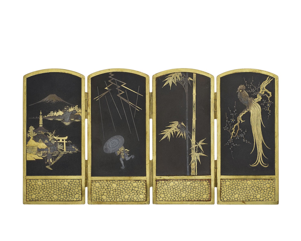 A small inlaid-iron table screen by Anonymous