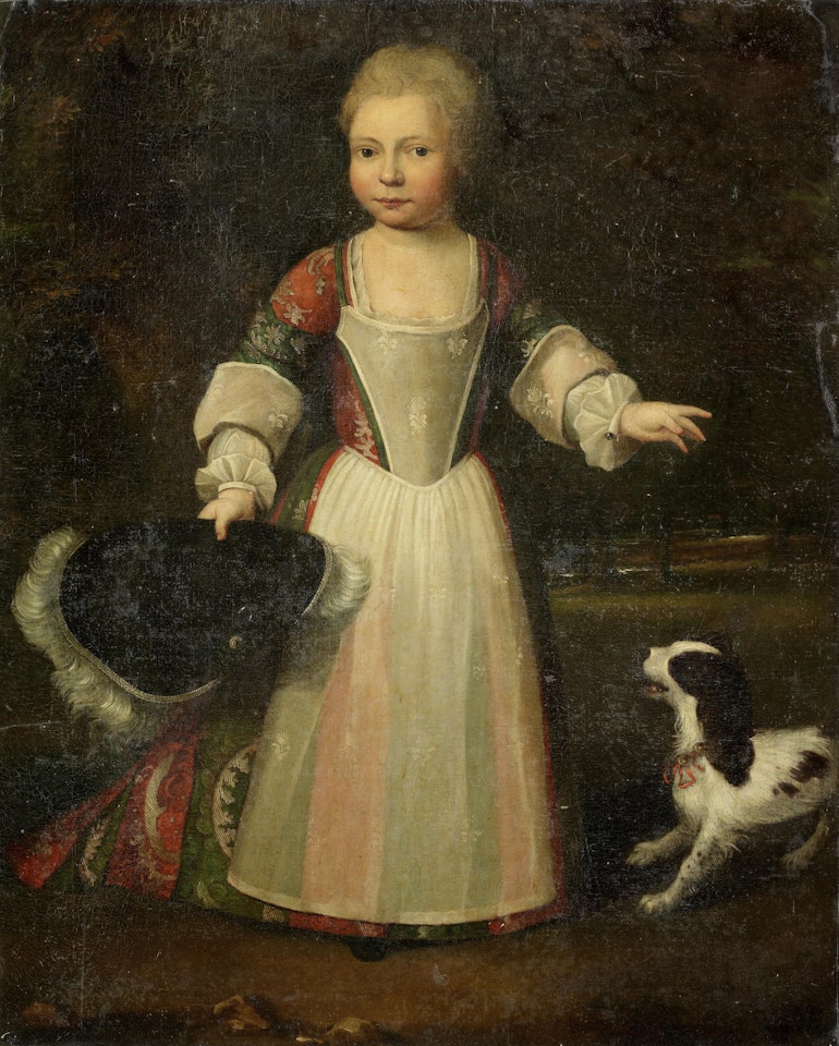 Portrait of a young child, standing full-length, with a spaniel before a landscape by English School