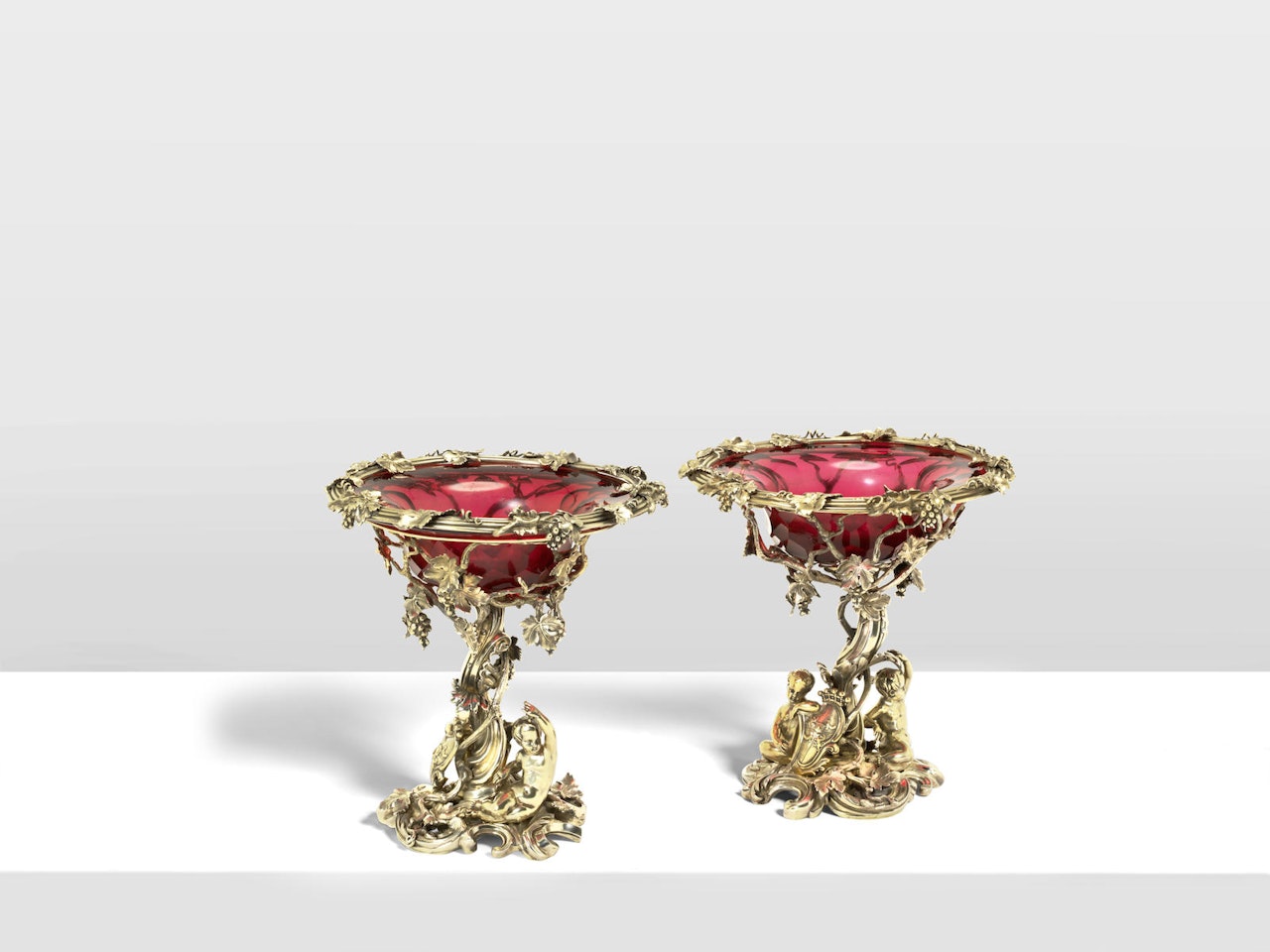 A pair of Victorian silver-gilt dessert stands by Anonymous