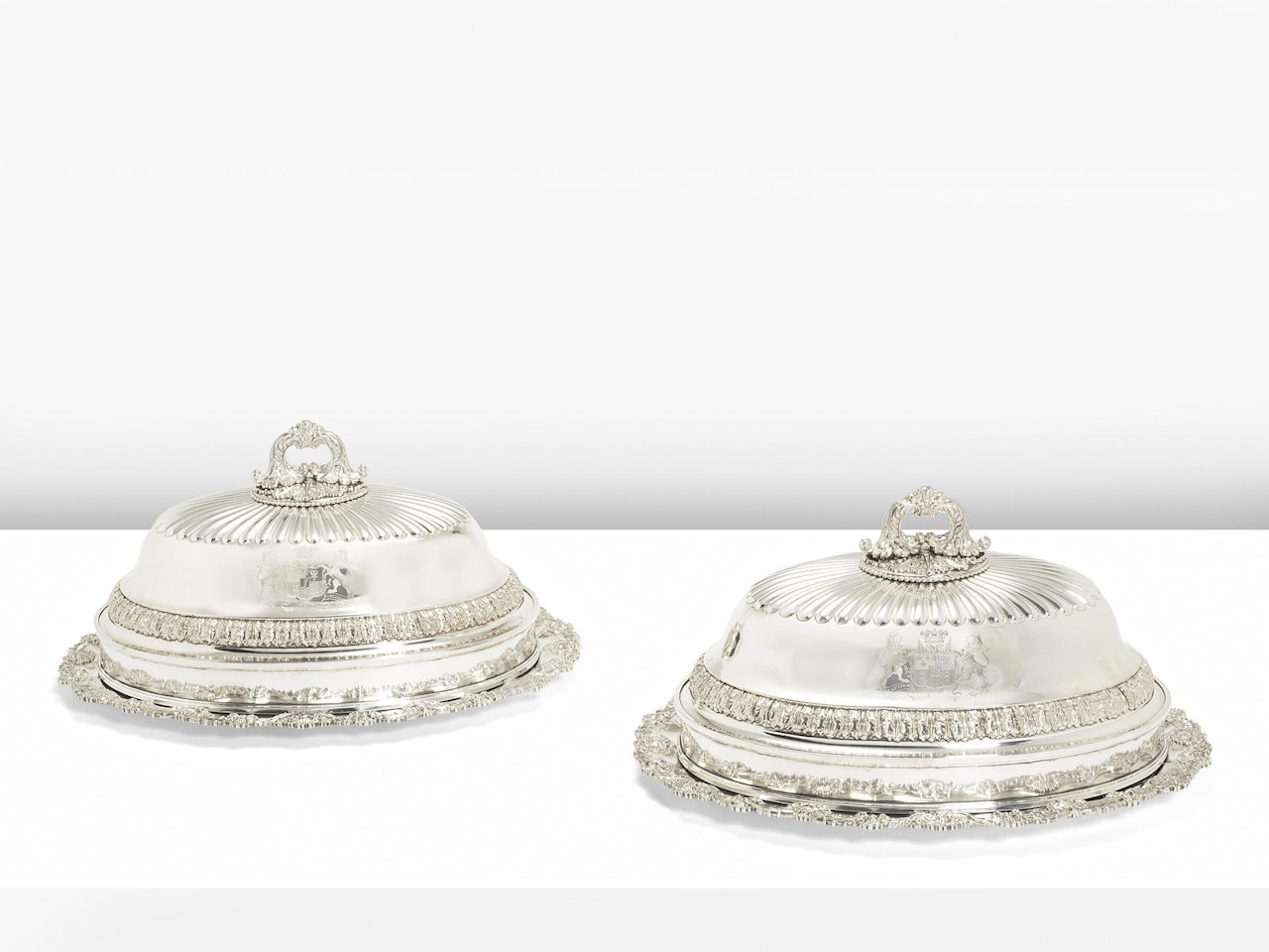 A Pair of George III silver meat dishes by Anonymous