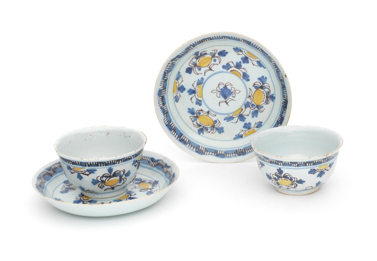 A rare pair of English delftware teabowls and saucers by Anonymous