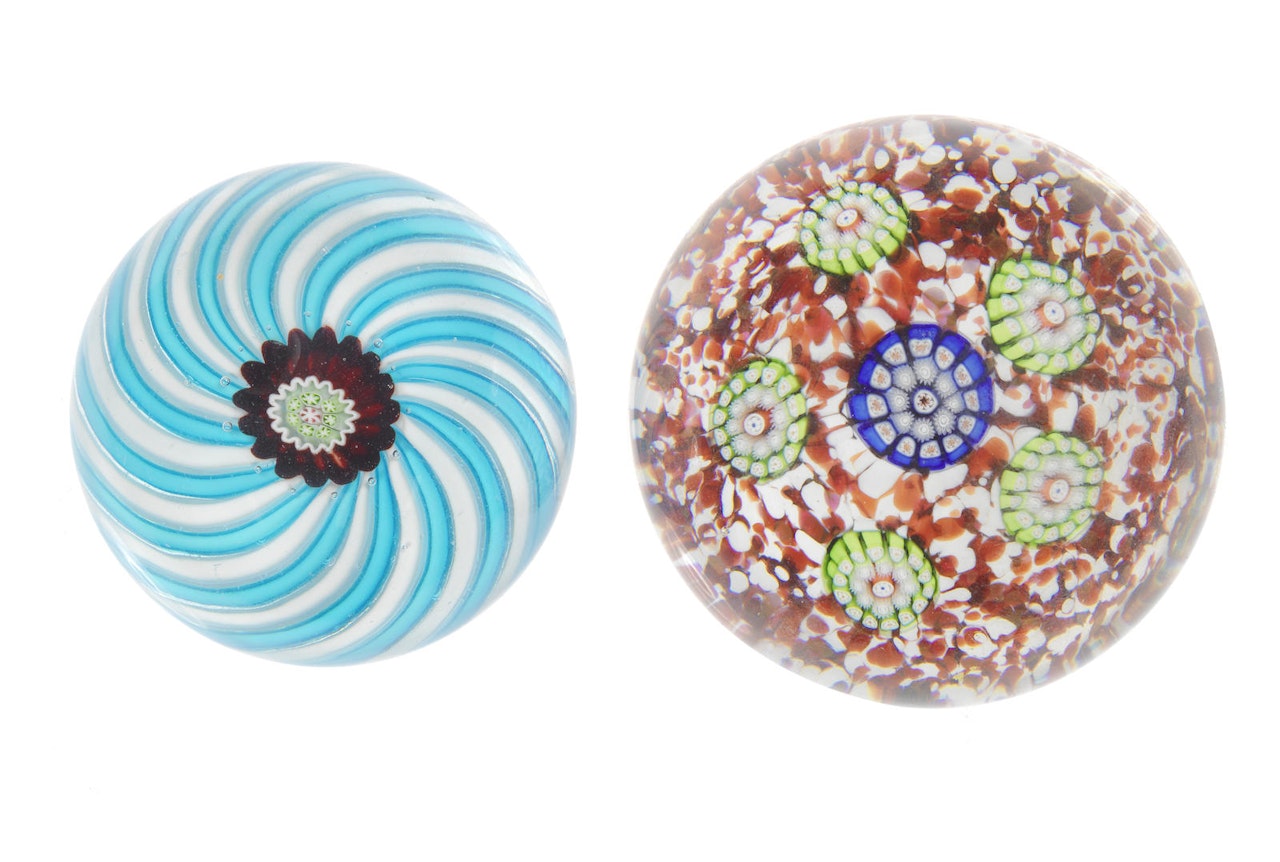 A St. Louis jasper-ground paperweight and a Clichy swirl weight by Anonymous