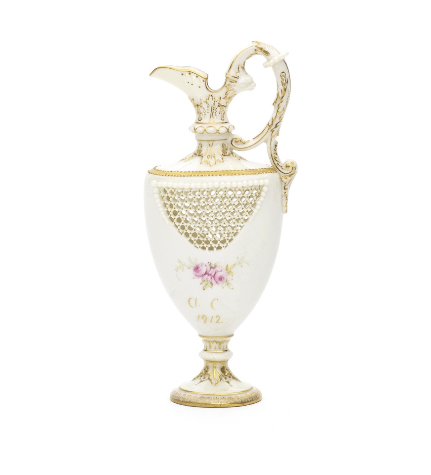 A Royal Worcester reticulated ewer by George Owen and Ernest Phillips by Anonymous