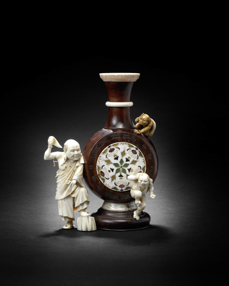A wood and ivory okimono figure group, By Homin by Anonymous