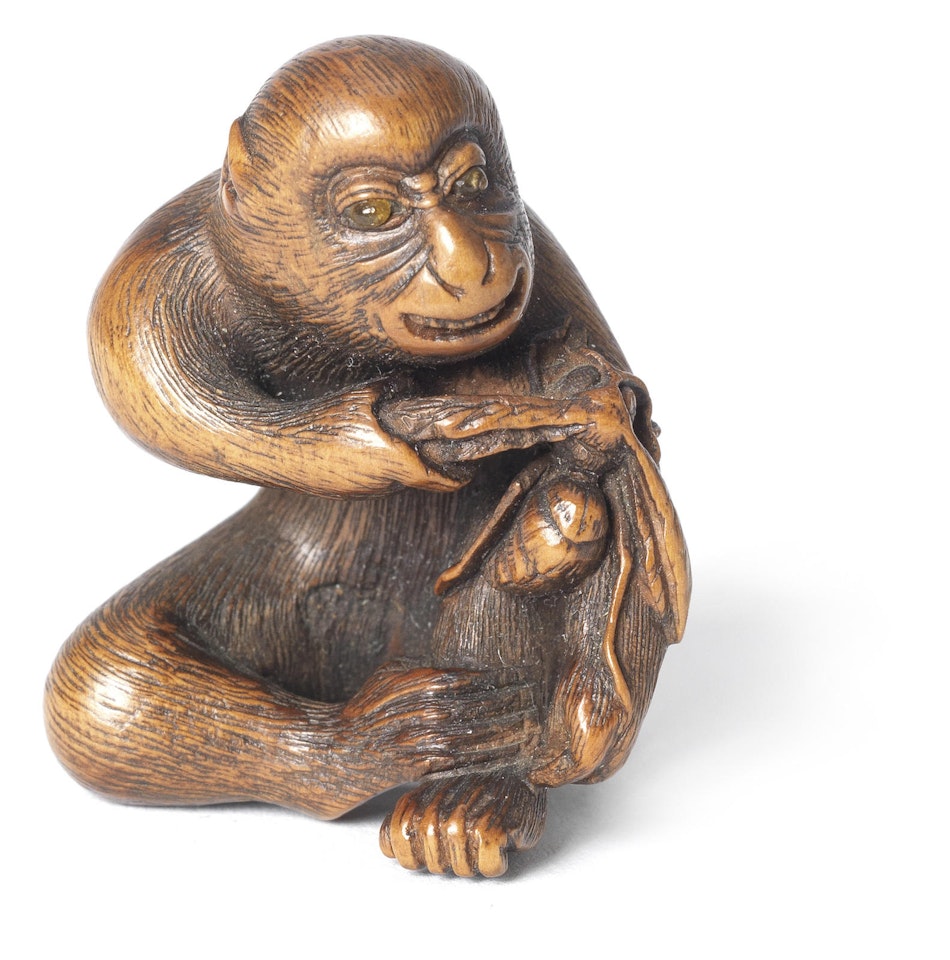 A wood netsuke of a monkey, School of Tomokazu by Anonymous